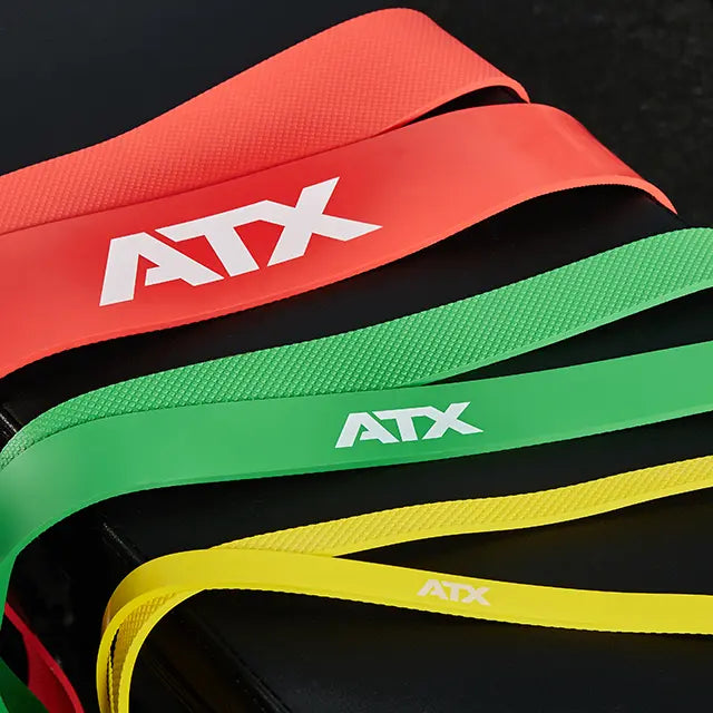 ATX® Widerstandsbänder in Rot, Grün und Gelb mit unterschiedlichen Bandbreiten und genoppter Innenseite